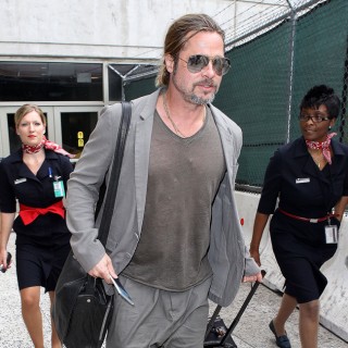 Brad Pitt arrives at the Los Angeles International Airport