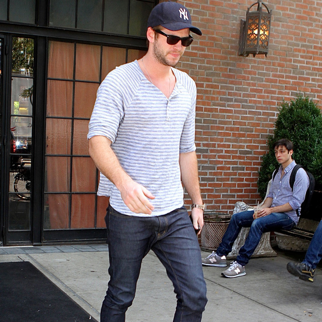 Liam Hemsworth steps out in NYC to look at his new restaurant El Digital de Asturias