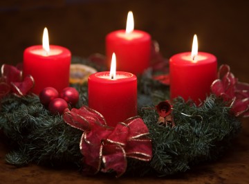 Four burning candles on advent wreath