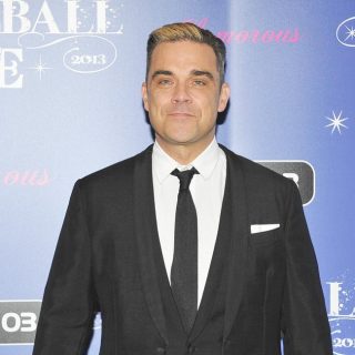 Robbie Williams performing at the Key 103 Jingle Ball in Manchester