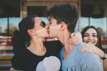 Kissing teenage couple